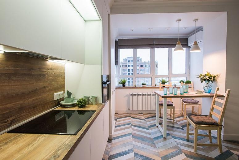 Фото прямая трехъярусная белая древесная матовая светлая кухня с пластиковыми фасадами в стиле Хай-Тек и в стиле Минимализм с пластиковой столешницей